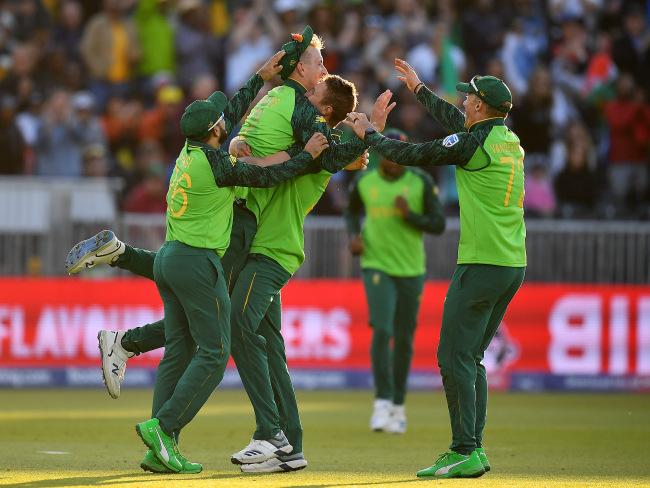 Dwaine Pretorius celebrates the vital wicket of David Warner. Picture: Getty