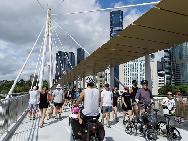 Crowds at the opening of the Kangaroo Point Bridge in Brisbane. Picture Lachie Millard