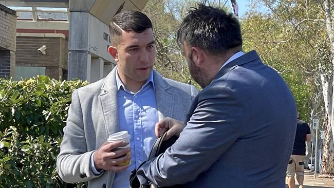 Real estate agent Kristian Contos (left) pictured with his lawyer, pleaded guilty to driving with an illicit drug present, second offence, when he appeared in Sutherland Local Court on Tuesday. Picture: Ashleigh Tullis