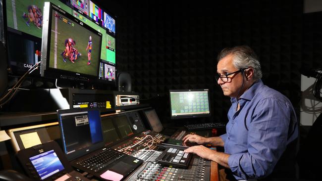 Fox Sports Head of Audio Tony Koveos conducts the crowd noise at the first NRL game following COVID-19 restrictions on sport Picture: Richard Dobson