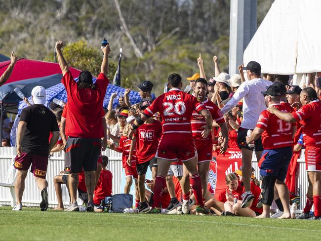 Walgett celebrates the win in the men's Koori Knockout grand final. Picture: Andrea Francolini