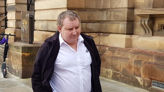 Nikola Novakovich outside the Supreme Court, where the State Government is seeking an order to monitor his movements once his parole expires. Picture: Sean Fewster.