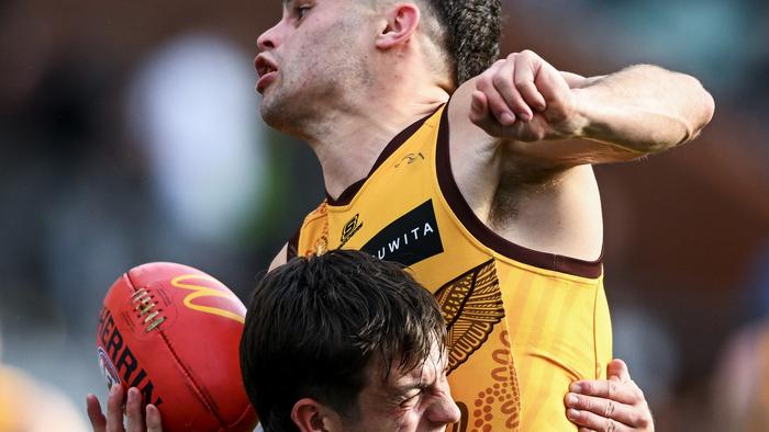 ADELAIDE, AUSTRALIA - JUNE 03: Karl Amon of the Hawks tackled by Zak Butters of Port Adelaide during the round 12 AFL match between Port Adelaide Power and Hawthorn Hawks at Adelaide Oval, on June 03, 2023, in Adelaide, Australia. (Photo by Mark Brake/Getty Images)