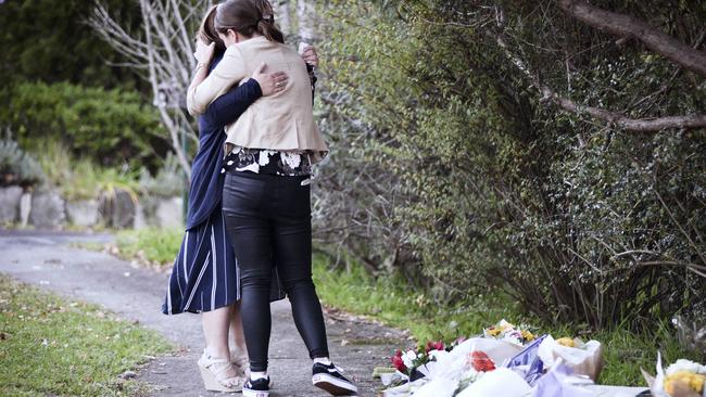 Mourners left flowers in a tribute outside the house where Jennifer Edwards and Jack Edwards were shot dead by their father John Edwards. Picture: Flavio Brancaleone