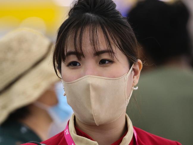 SYDNEY, AUSTRALIA - Newswire Photos JANUARY 02, 2022: Cathay Pacific Flight Crew are seen arriving at the Sydney International Airport arrivals terminal, off a flight from Hong Kong after Australia set new Covid entry rules for travellers entering the country from China. The government is reportedly considering testing plane waste water on affected flights also. Picture: NCA Newswire / Gaye Gerard