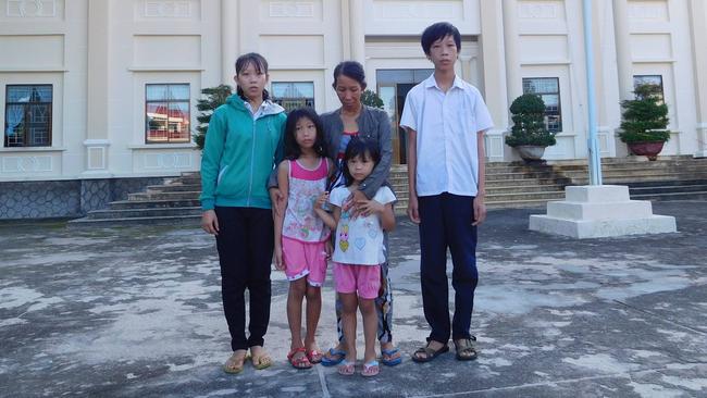 Ms Loan  with her four children outside courthouse where her appeal against a three-year sentence was rejected.