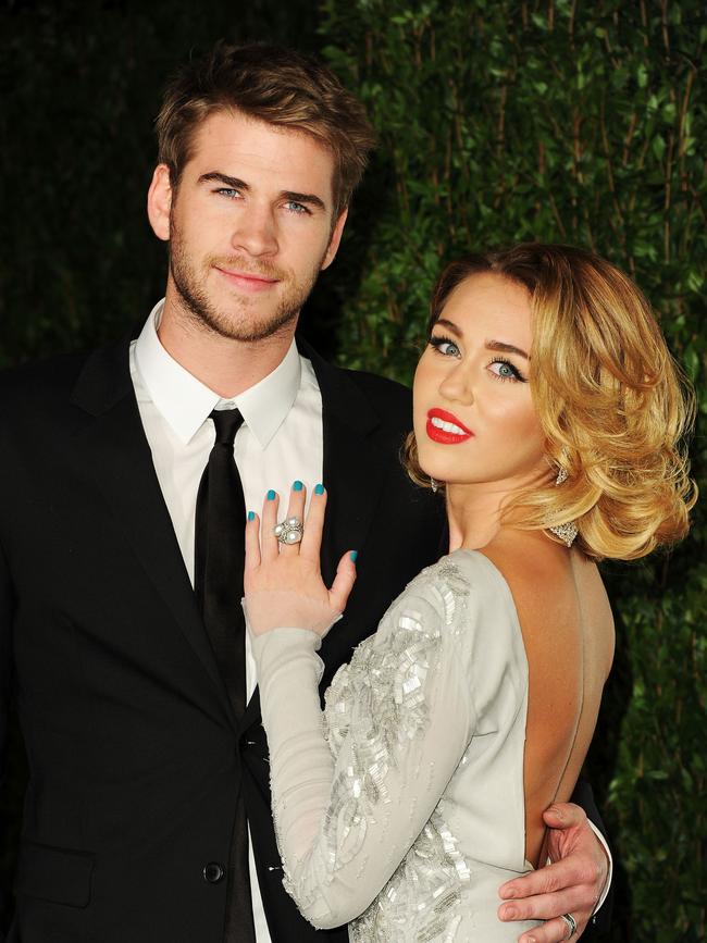 Liam Hemsworth and actress/singer Miley Cyrus arrive at the 2012 Vanity Fair Oscar Party. Picture: Getty