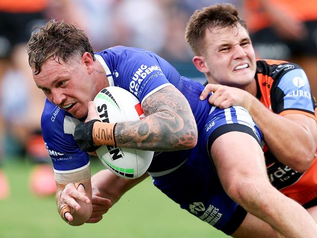 SYDNEY, AUSTRALIA - MAY 04: Kurt Mann of the Bulldogs scores a try during the round nine NRL match between Canterbury Bulldogs and Wests Tigers at Accor Stadium, on May 04, 2024, in Sydney, Australia. (Photo by Brendon Thorne/Getty Images)