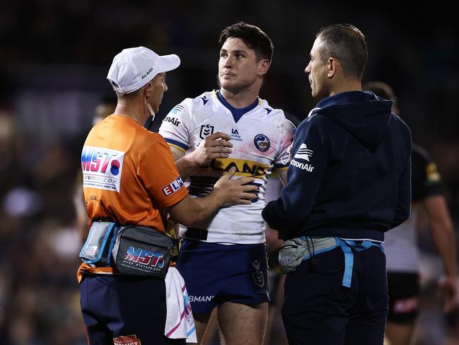 PENRITH, AUSTRALIA - SEPTEMBER 09:  Mitchell Moses of the Eels is attended to by trainers after a tackle during the NRL Qualifying Final match between the Penrith Panthers and the Parramatta Eels at BlueBet Stadium on September 09, 2022 in Penrith, Australia. (Photo by Matt King/Getty Images)