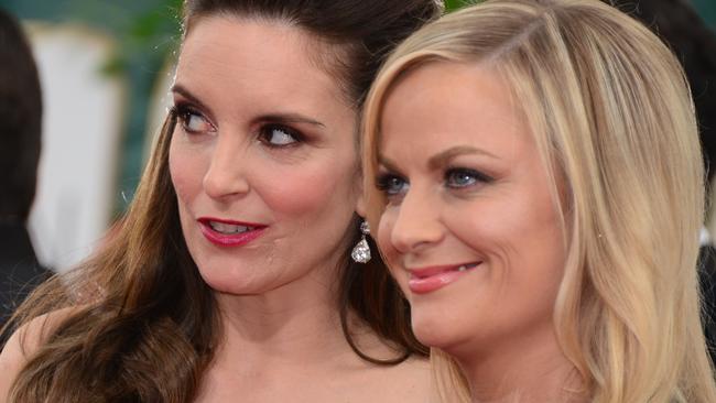 Tina Fey and Amy Poehler will host the 2021 Golden Globes. Picture: Frederic J. Brown/AFP