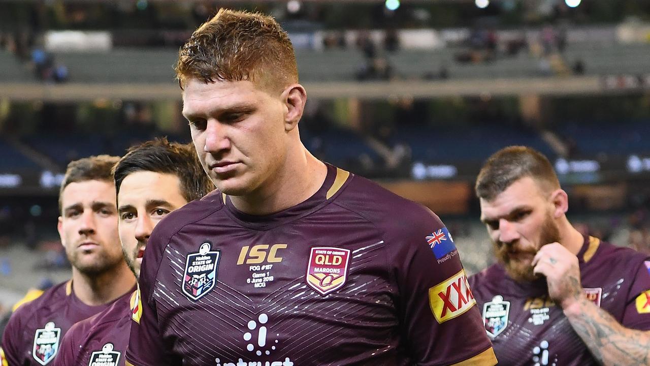 Dylan Napa of the Maroons and his teammates look dejected after losing Origin I.