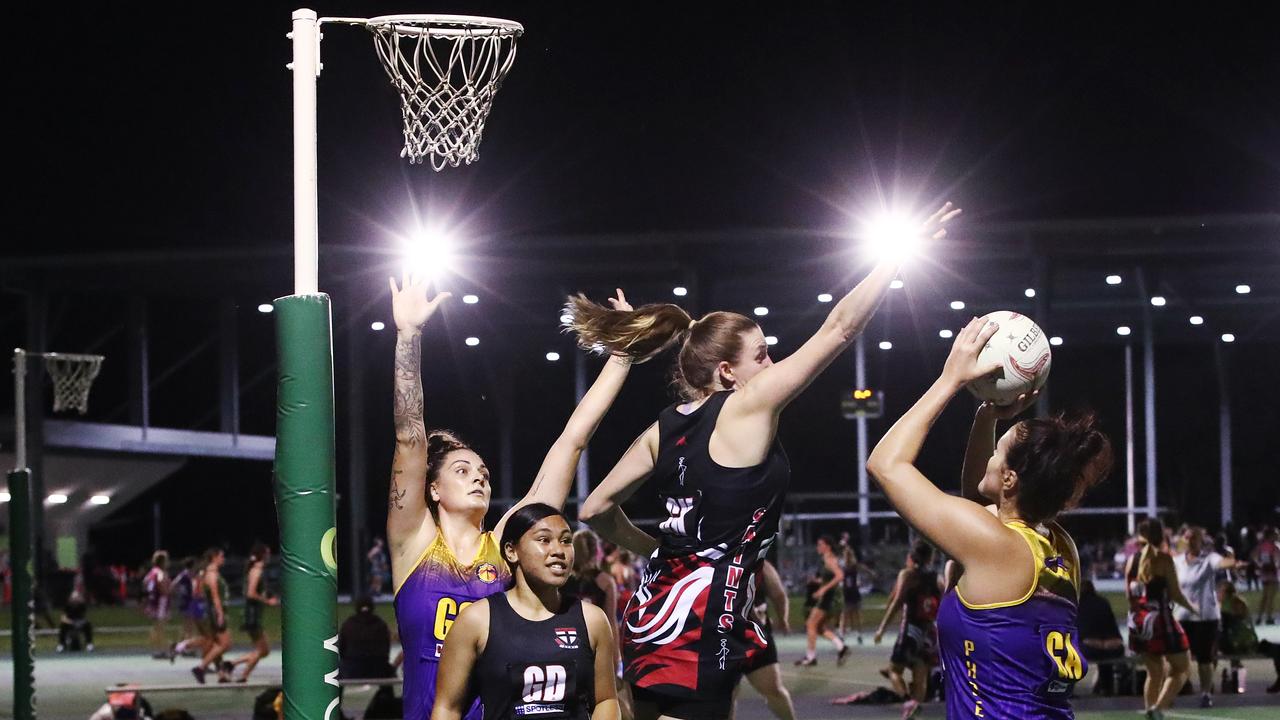 Fierce's Cayla George and Jade Kennedy dominate over the Saints defenders in the Cairns Netball Association Senior Division 1 match between the Phoenix Fierce and the Cairns Saints. PICTURE: BRENDAN RADKE