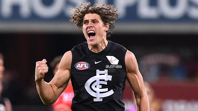 Charlie Curnow of the Blues reacts after kicking a goal during the Round 19 AFL match between the Gold Coast Suns and the Carlton Blues at Metricon Stadium at Carrara on the Gold Coast, Saturday, July 28, 2018. (AAP Image/Dave Hunt) NO ARCHIVING, EDITORIAL USE ONLY