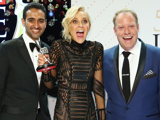 Waleed Aly, Carrie Bickmore and Peter Helliar pose with the Logie Award for Best News Panel or Current Affairs Program. Picture: Scott Barbour
