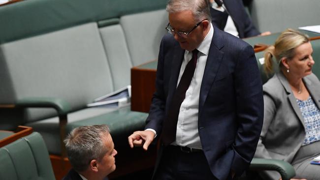 Anthony Albanese speaks with his predecessor Bill Shorten, who is also the opposition’s government services spokesman, during question time on Tuesday. Picture: Getty Images