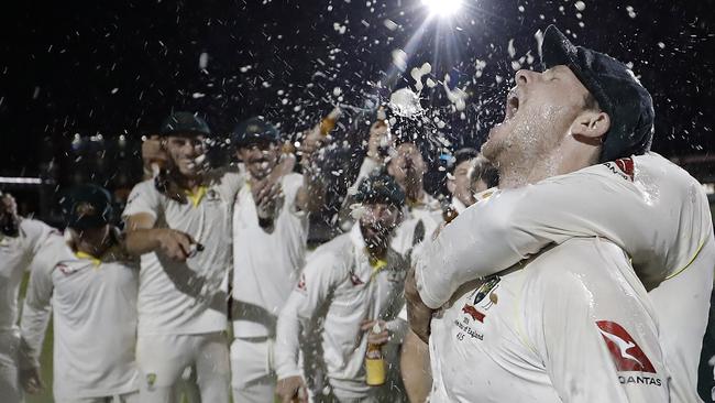 Steve Smith leads the celebration charge at Old Trafford.