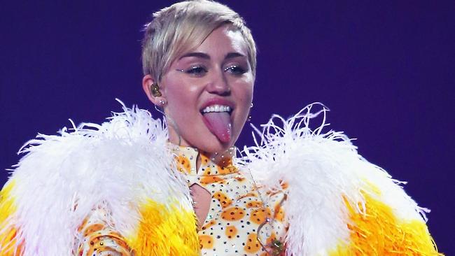 MELBOURNE, AUSTRALIA - OCTOBER 10: Miley Cyrus performs at the opening night of her Bangerz Tour in Australia at Rod Laver Arena on October 10, 2014 in Melbourne, Australia. (Photo by Scott Barbour/Getty Images)