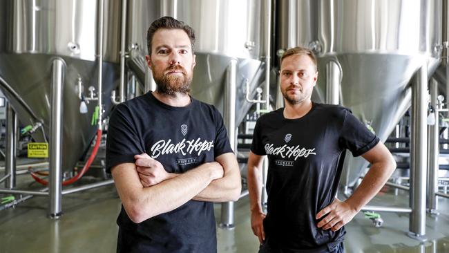 Black Hops Brewery co-founders Dan Norris and Eddie Oldfield. The Queensland brewery was placed in administration last month. Picture: Tim Marsden