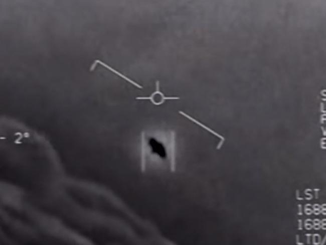 (FILES) This file video grab image obtained April 28, 2020 courtesy of the US Department of Defense shows part of an unclassified video taken by Navy pilots that have circulated for years showing interactions with "unidentified aerial phenomena". - Are aliens watching us?  That's what Americans hope to find out when a report on the US government's secret files on UFOs goes to Congress next month after years of sightings and videos suggesting that highly advanced extraterrestrials are, indeed, out there. But the report from the Director of National Intelligence, pulled together with classified military files, could fall short of explaining scores of purported unidentified flying object incidents over decades. (Photo by Handout / DoD / AFP) / RESTRICTED TO EDITORIAL USE - MANDATORY CREDIT "AFP PHOTO /US DEPARTMENT OF DEFENSE/HANDOUT " - NO MARKETING - NO ADVERTISING CAMPAIGNS - DISTRIBUTED AS A SERVICE TO CLIENTS / To go with AFP story by Sylvie LANTEAUME: "Looming US intelligence report to address UFOs"