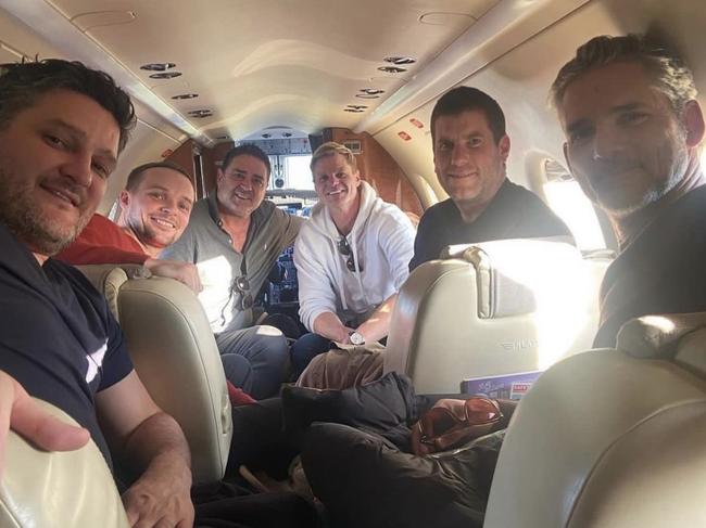 Brendan Fevola, Dylan Buckley, Garry Lyon, Nick Riewoldt, Alex Riewoldt and Eric Bana on the charter flight to Cobram Estate.