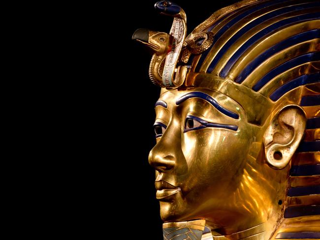 Two-faced? Tutankhamun's famous death mask may have been modified at the last moment to contain his face. Many of the boy-king’s treasures appear to have belonged to near relatives. Source: AFP