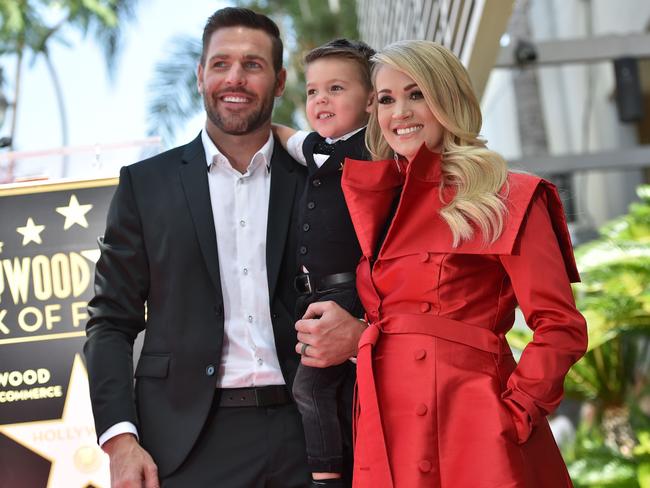 Carrie Underwood and husband Mike Fisher and their 3-year-old son Isaiah Michael at her star unveiling ceremony on the Hollywood Walk of Fame, September 20, 2018. Pic: AFP