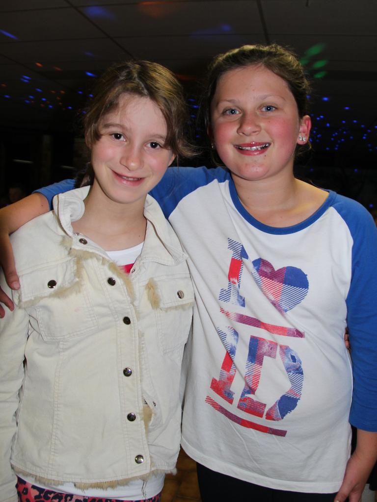 Jess Coombes and Rebecca Sinclair hang out at the Blue Light Disco on Friday night. Photo Erin Smith / Stanthorpe Border Post