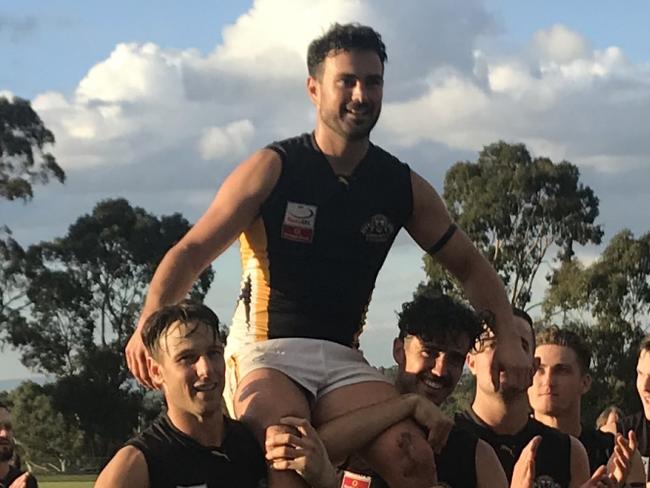 Rennie Gilchrist chaired off after his 150th game for Balwyn in the Eastern Football League (EFL). Picture: Supplied