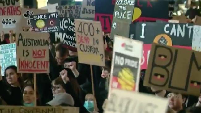 The protesters held signs that read ‘We can’t breathe’ and ‘400 plus dead in custody’. Picture: Channel 10