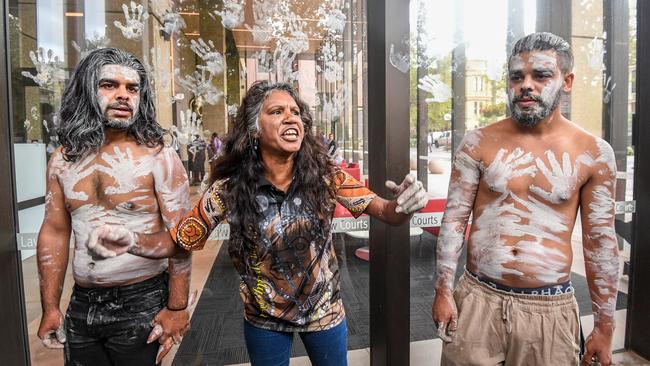 Bowraville community members react outside of the Supreme Court in Sydney, Friday, March 22, 2019. The High Court has refused to hear an appeal over a decision rejecting a bid for a man to face trial on charges of murdering three Bowraville children. (AAP Image/Peter Rae) NO ARCHIVING