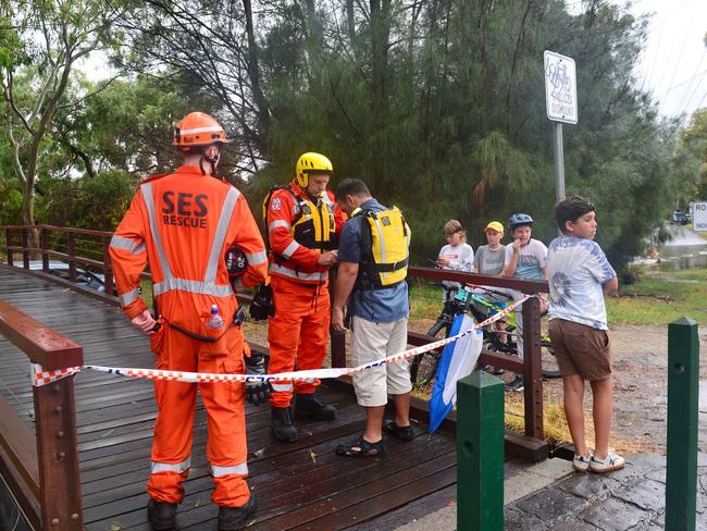 Heavy rain in Melbourne saw a car was washed away into the canal in Elwood. Picture: Nicki Connolly