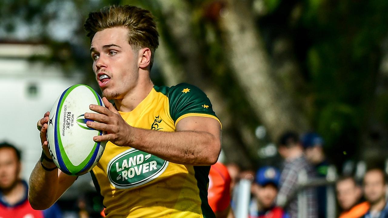 Will Harrison of Austalia runs at Club de Rugby Ateneo Inmaculada.