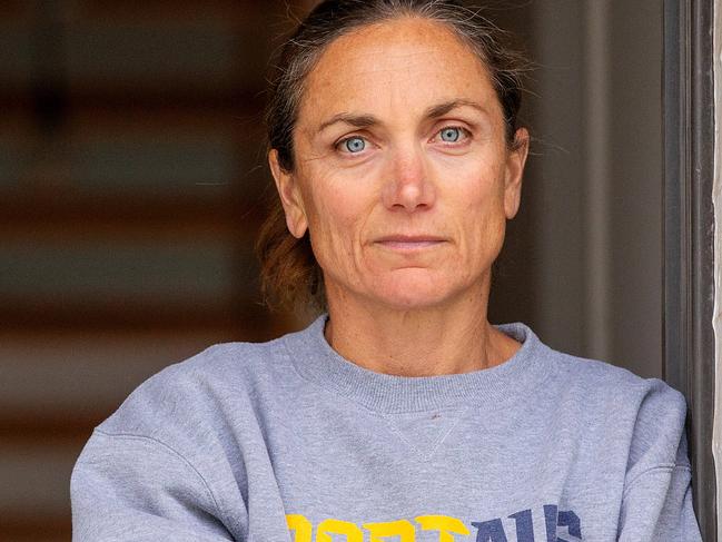 Former champion triathlete Emma Carney pictured outside her home for a story on a dispute she is having with a law firm. Picture: Mark Stewart