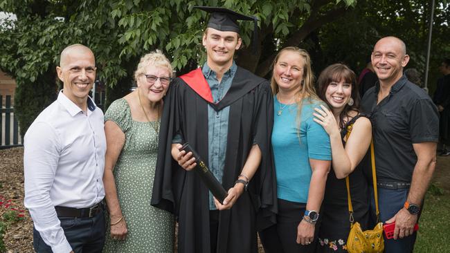 Bachelor of Information Technology graduate Byron Mammana with (from left) Michael Mammana, Julie Wahren, Lisa Mammana, Katie Gear and Andrew Westwick at a UniSQ graduation ceremony at Empire Theatres, Tuesday, February 13, 2024. Picture: Kevin Farmer