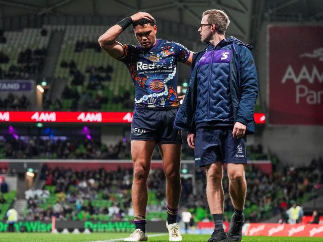 Xavier Coates hobbles from the field. Picture: NRL Photos