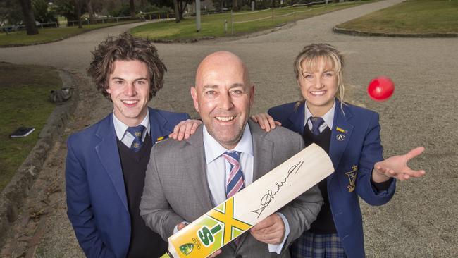 Darren Lehmann with Salesian College school captains Mathew McDonald and Olivia Cautlet. Picture: Rob Leeson