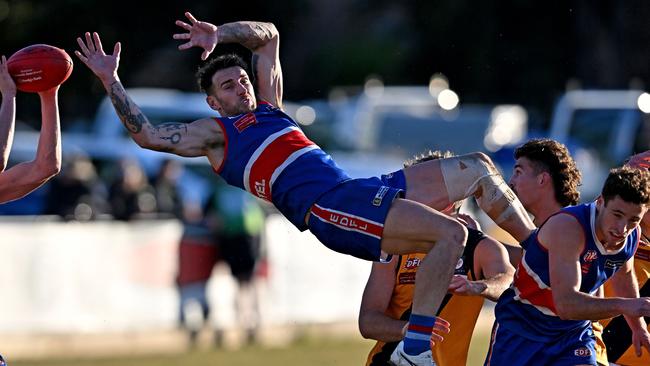 Keilor’s Jesse Wallin attempts a screamer. Picture: Andy Brownbill