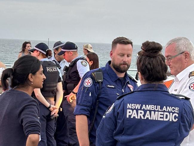 Police and paramedics at Bondi Beach after four people were rescued from the waves. Picture: Supplied