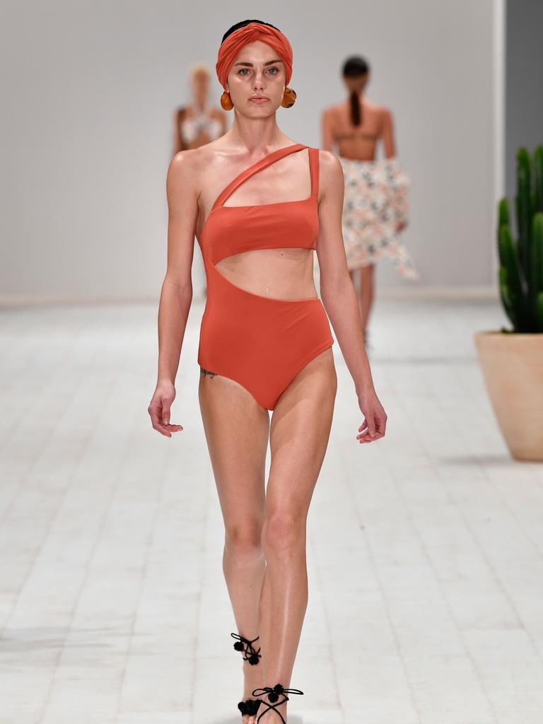 A model walks the runway in a design by Fella during the Swim show at Mercedes-Benz Fashion Week Resort 19 Collections at Carriageworks on May 14, 2018 in Sydney, Australia. (Photo by Stefan Gosatti/Getty Images)