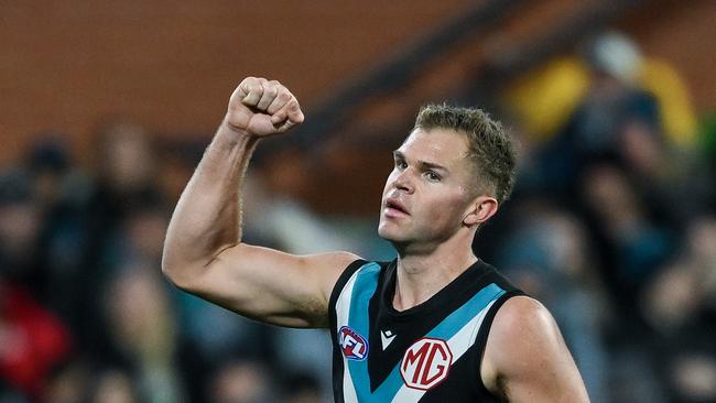 ADELAIDE, AUSTRALIA - AUGUST 03: Dan Houston of the Power celebrates a goal during the round 21 AFL match between Port Adelaide Power and Sydney Swans at Adelaide Oval, on August 03, 2024, in Adelaide, Australia. (Photo by Mark Brake/Getty Images)