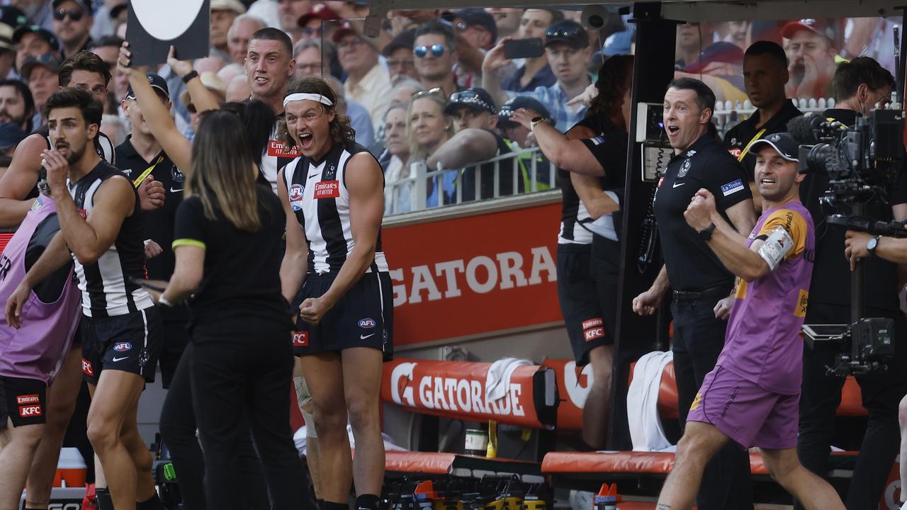 The Collingwood bench celebrates. Picture: Daniel Pockett/AFL Photos