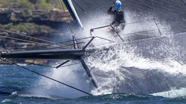 A bowman aboard Scallywag on a harbour race. It will be more intense in the Sydney to Hobart for crew. Picture: Andrea Francolini.