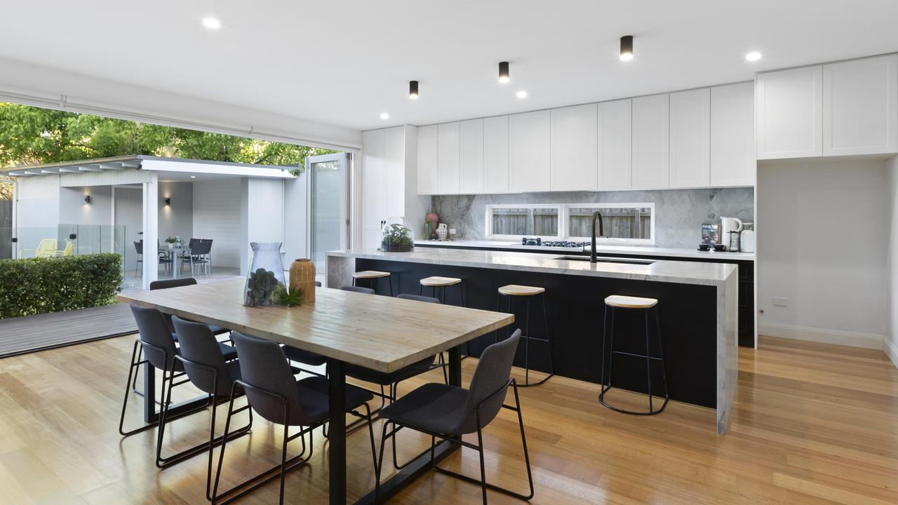 The home’s polished timber floors, box bay windows, and plantation shutters blend its character features with modern elements.