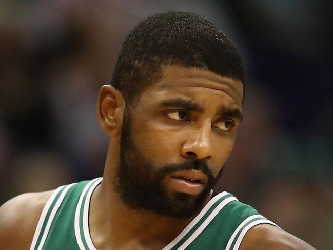 PHOENIX, AZ - NOVEMBER 08: Kyrie Irving #11 of the Boston Celtics reacts during the second half of the NBA game against the Phoenix Suns at Talking Stick Resort Arena on November 8, 2018 in Phoenix, Arizona. The Celtics defeated the Suns 116-109 in overtime. NOTE TO USER: User expressly acknowledges and agrees that, by downloading and or using this photograph, User is consenting to the terms and conditions of the Getty Images License Agreement.   Christian Petersen/Getty Images/AFP == FOR NEWSPAPERS, INTERNET, TELCOS & TELEVISION USE ONLY ==