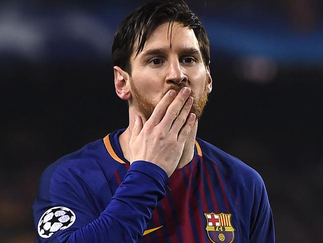(FILES) In this file photo taken on March 14, 2018 Barcelona's Argentinian forward Lionel Messi blows a kiss after scoring a goal during the UEFA Champions League round of sixteen second leg football match between FC Barcelona and Chelsea FC at the Camp Nou stadium in Barcelona. - Lionel Messi will end his 20-year career with Barcelona after the Argentine superstar failed to reach agreement on a new deal with the club, the Spanish giants announced on August 5, 2021. (Photo by Josep LAGO / AFP)