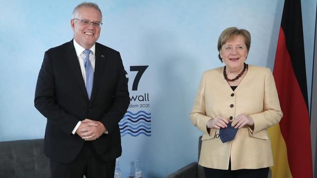 Scott Morrison and German Chancellor Angela Merkel at the Carbis Bay Estate in Cornwall on Sunday. Picture: Adam Taylor