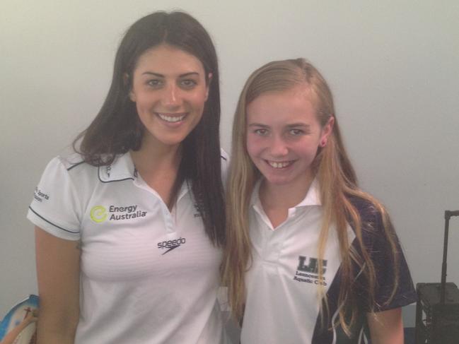 Australian swimmer Ariarne Titmus (right) meeting her childhood idol Stephanie Rice. Picture: Steve Titmus.