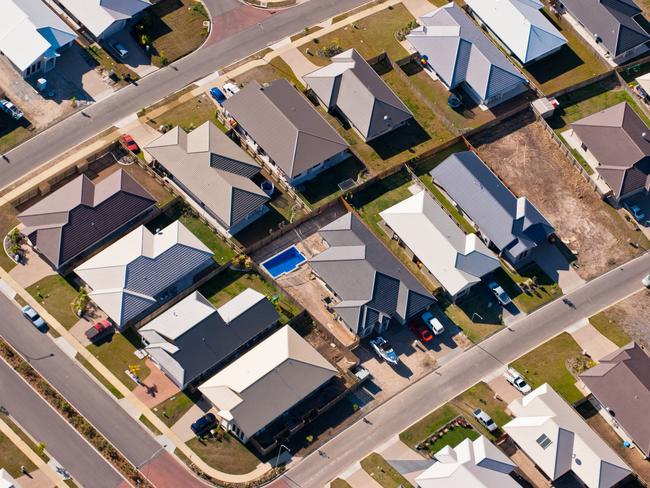 Aerial photograph of a suburban housing development in Townsville, Australia.