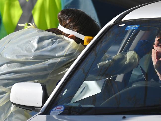 SYDNEY, AUSTRALIA - NewsWire Photos SEPTEMBER 1, 2020: Members of the public are tested for Coronavirus (COVID-19) by health workers at a drive-through testing clinic in Rozelle. Picture: NCA NewsWire / Steven Saphore