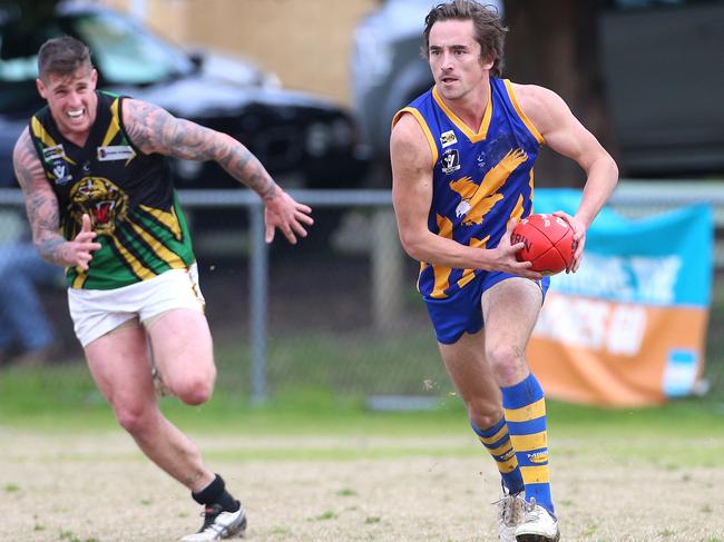 Somerville playing-coach David Hirst was lively before hurting his foot against Dromana on Saturday. Picture: Hamish Blair